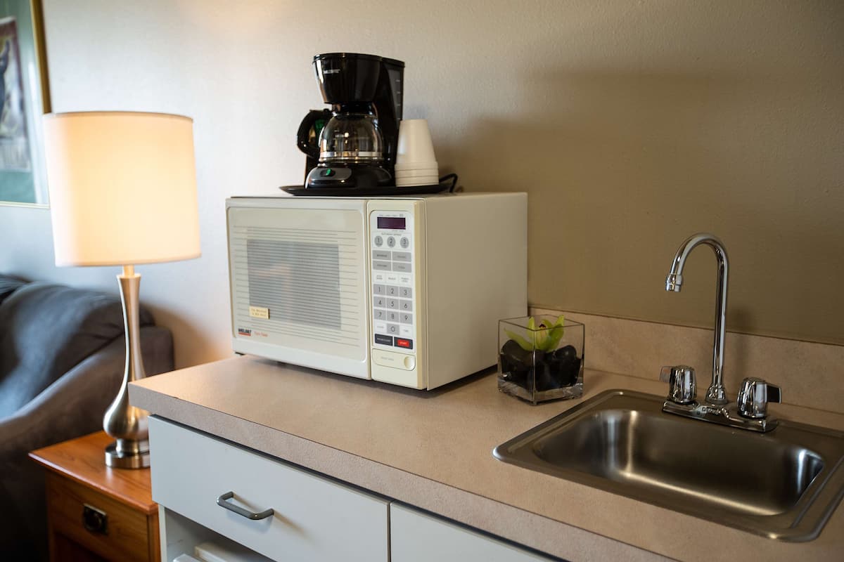 in-room safe, desk, blackout curtains, iron/ironing board