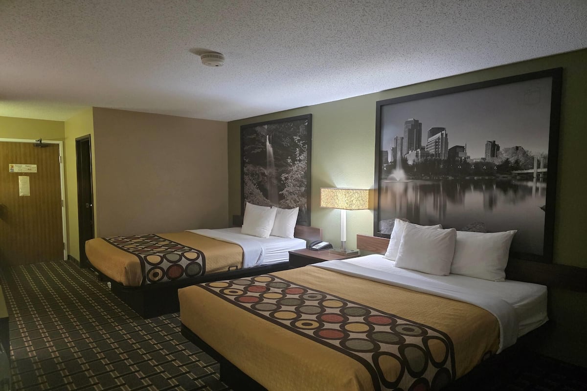Comfort Room, 2 Queen Beds, Non Smoking | Desk, free WiFi, bed sheets, alarm clocks