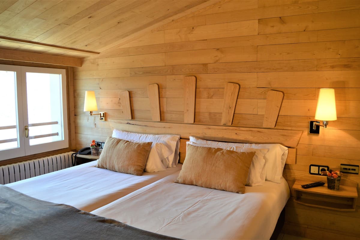 deluxe double room | premium bedding, in-room safe, desk, soundproofing