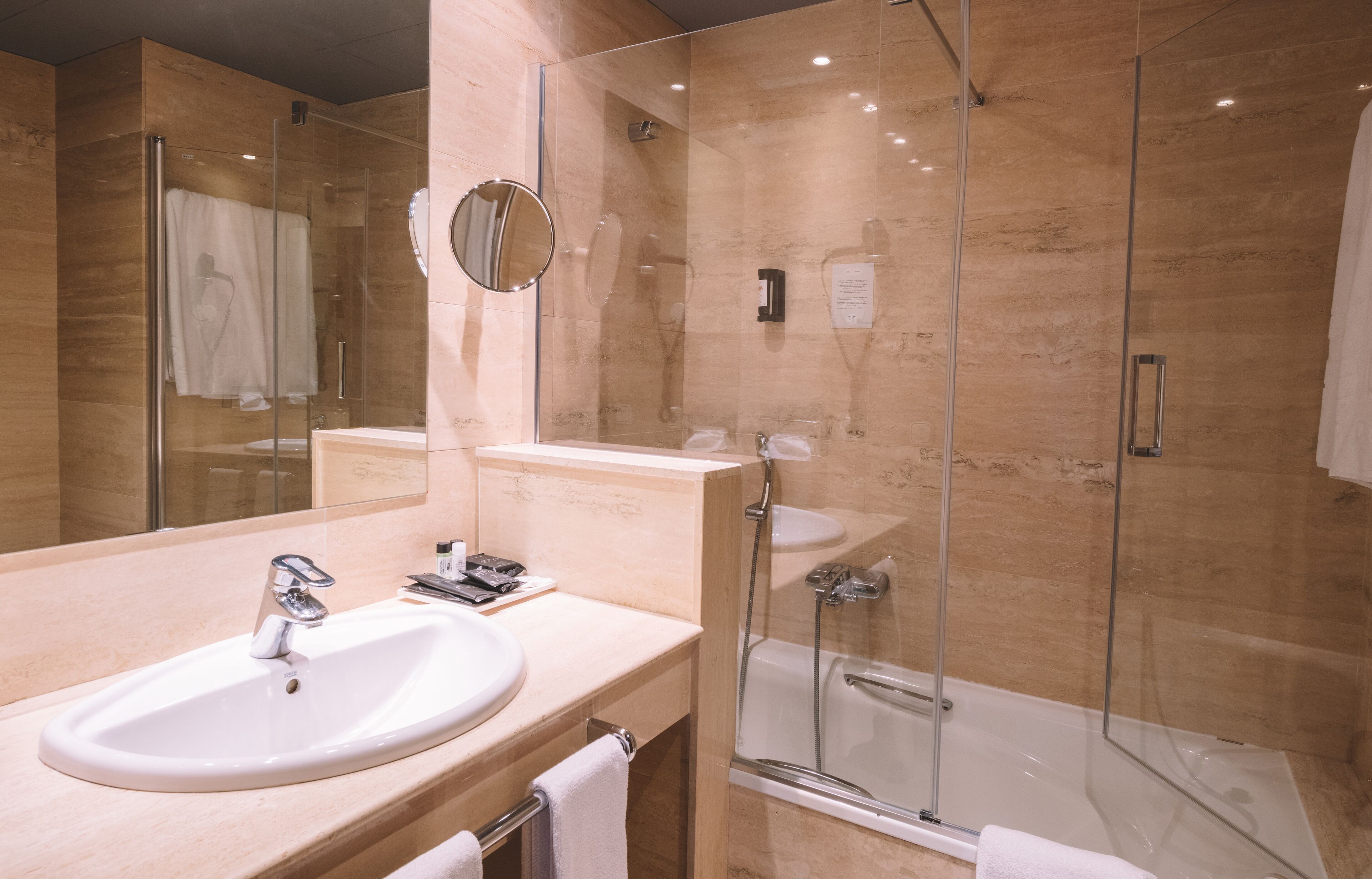 free toiletries, hair dryer, slippers, bidet