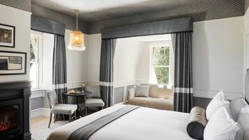 Premium bedding, down duvets, free minibar items, in-room safe