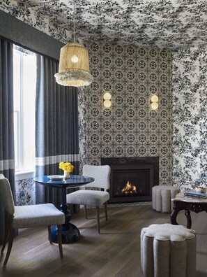 Premium bedding, down duvets, free minibar items, in-room safe