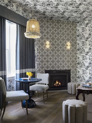 Premium bedding, down comforters, free minibar items, in-room safe