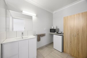 Shower, free toiletries, hair dryer, towels