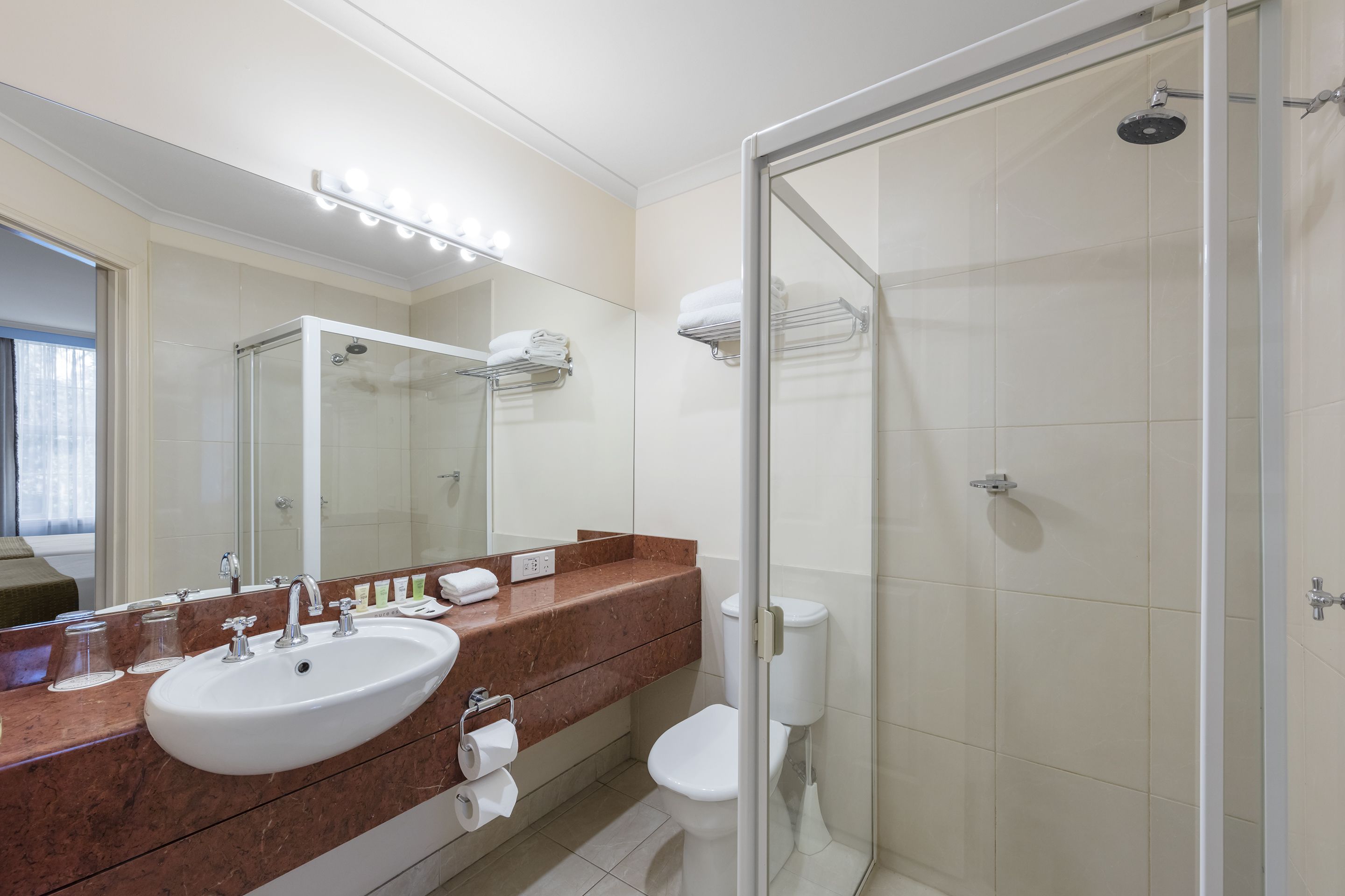 twin suite | bathroom | shower, free toiletries, hair dryer, towels