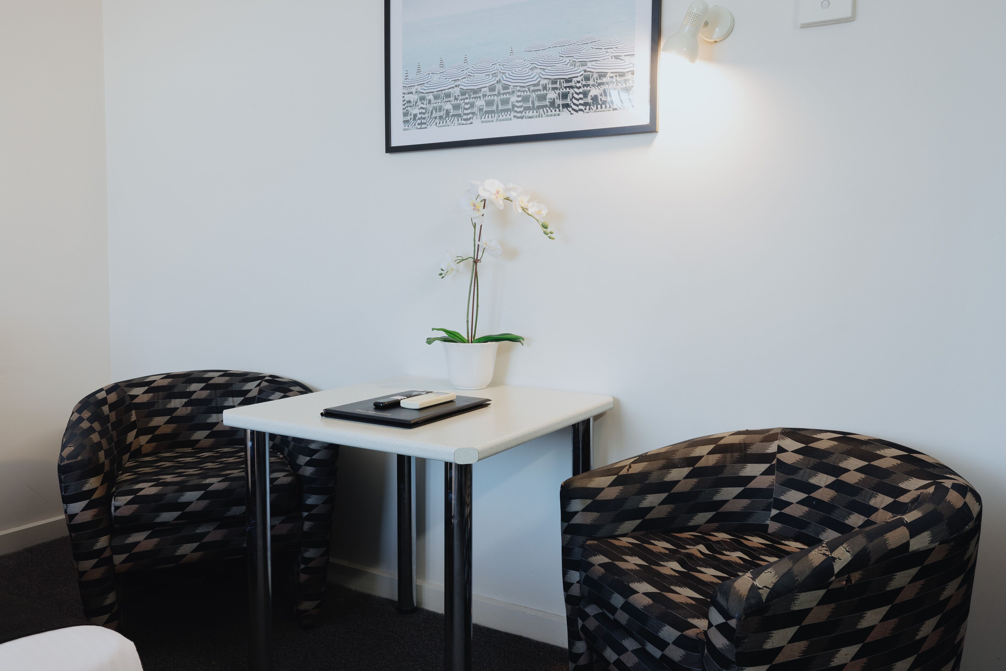 deluxe room, 1 king bed | living area | tv, pay films