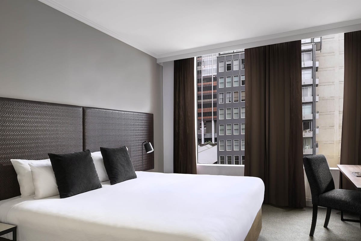 Minibar, desk, laptop workspace, blackout curtains