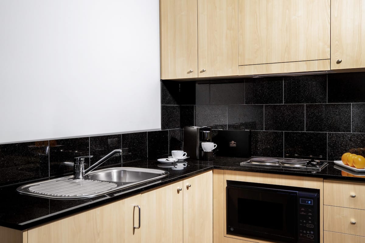 Premium Studio (Executive) | Bathroom | Separate tub and shower, free toiletries, hair dryer, towels