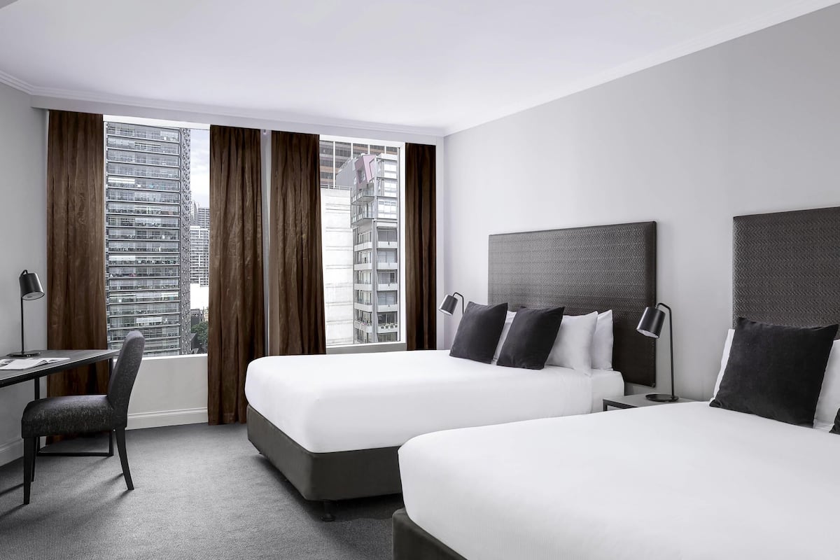 Studio, 2 Double Beds | Minibar, desk, laptop workspace, blackout drapes