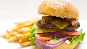 A burger with fries.