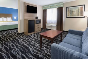 Suite, 1 King Bed, Non Smoking | Down duvets, pillow-top beds, desk, blackout curtains