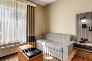 Suite, 1 King Bed with Sofa bed, Non Smoking | Desk, laptop workspace, iron/ironing board, free cribs/infant beds