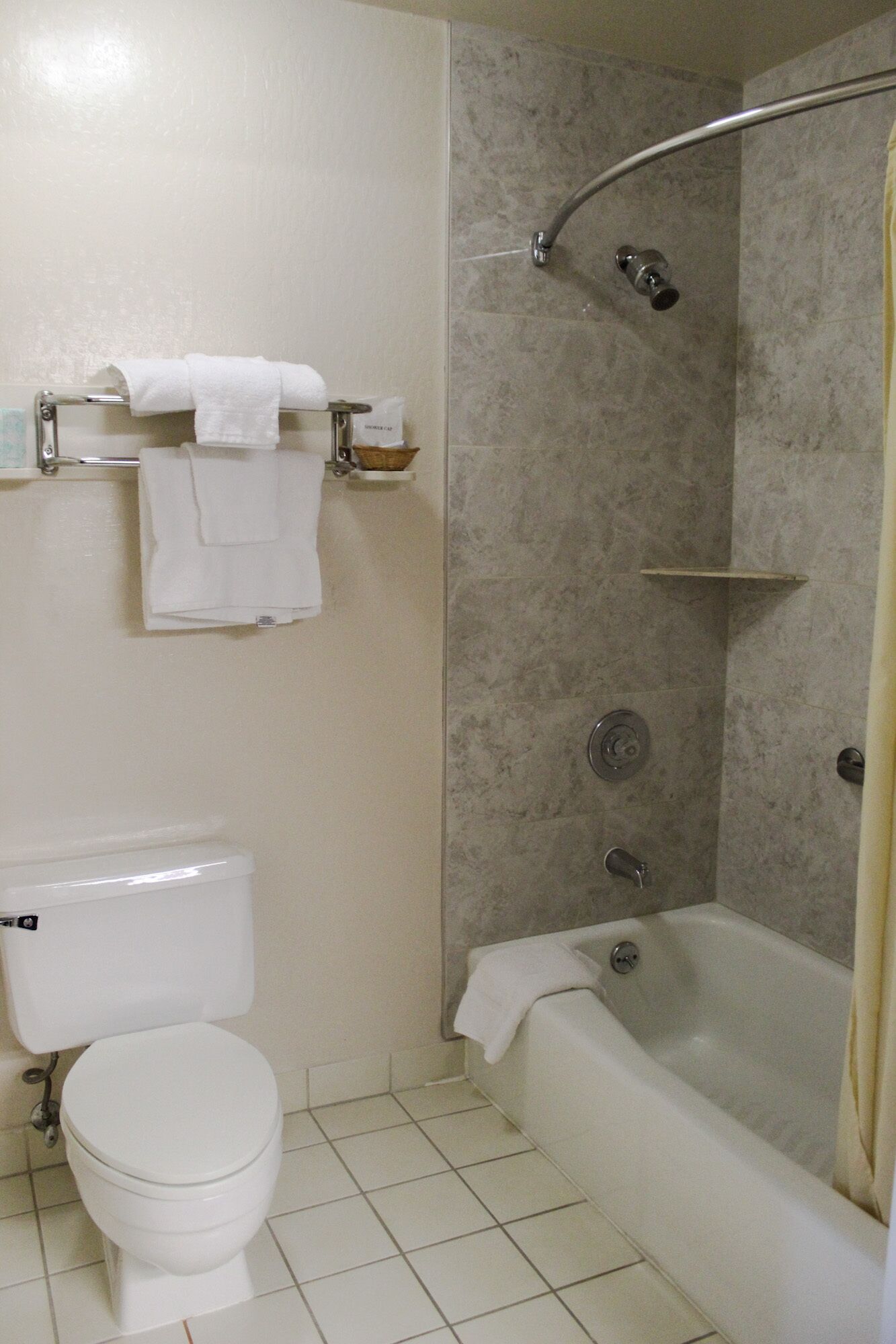 bathtub, free toiletries, towels