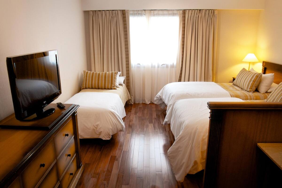 Premium bedding, down comforters, pillowtop beds, minibar