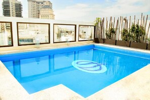 Seasonal outdoor pool, pool umbrellas, sun loungers
