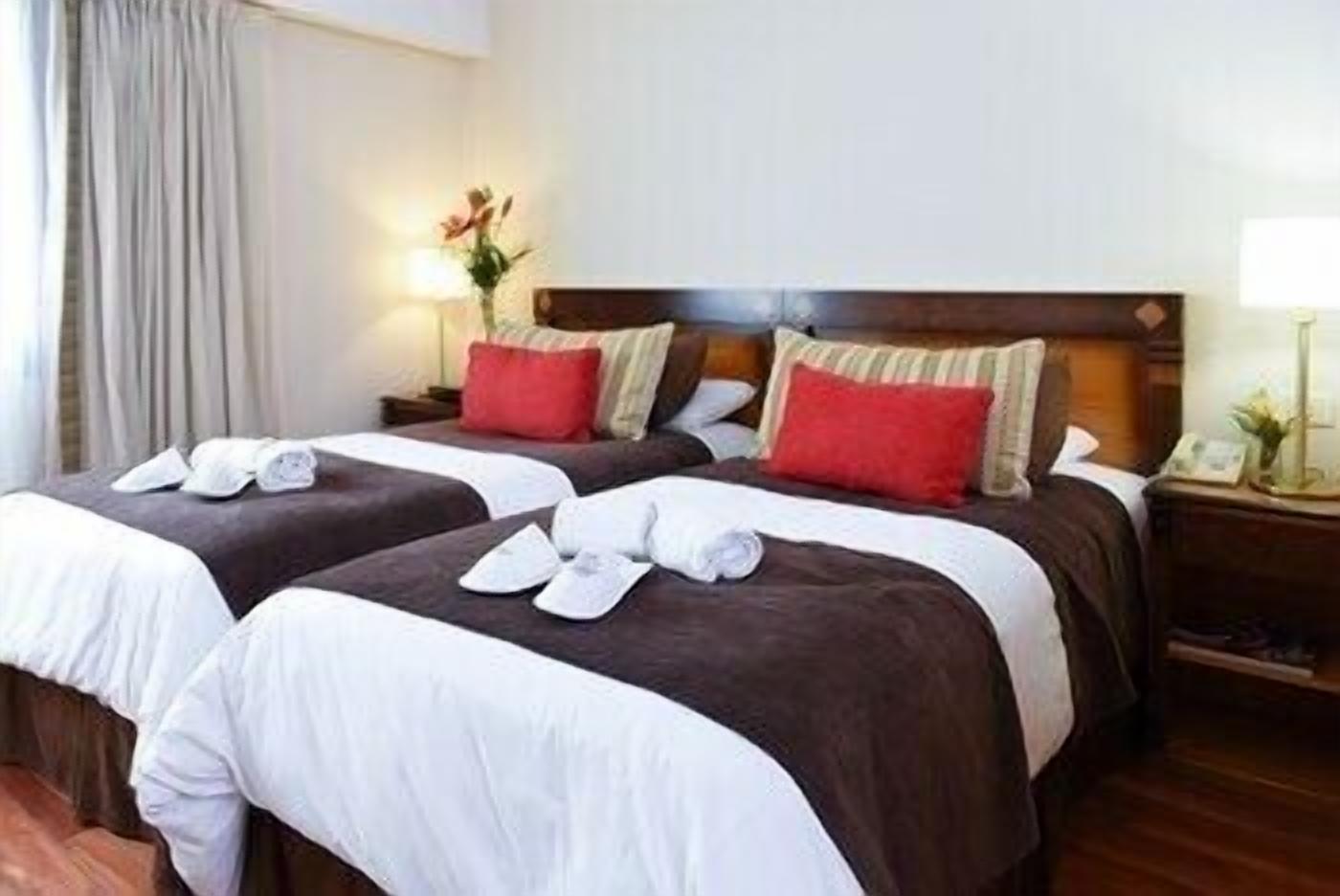 Premium bedding, down comforters, pillowtop beds, minibar