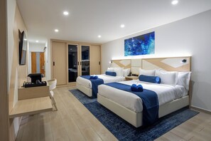 Standard Room, 2 Queen Beds, Garden View | In-room safe, blackout drapes, iron/ironing board, free WiFi