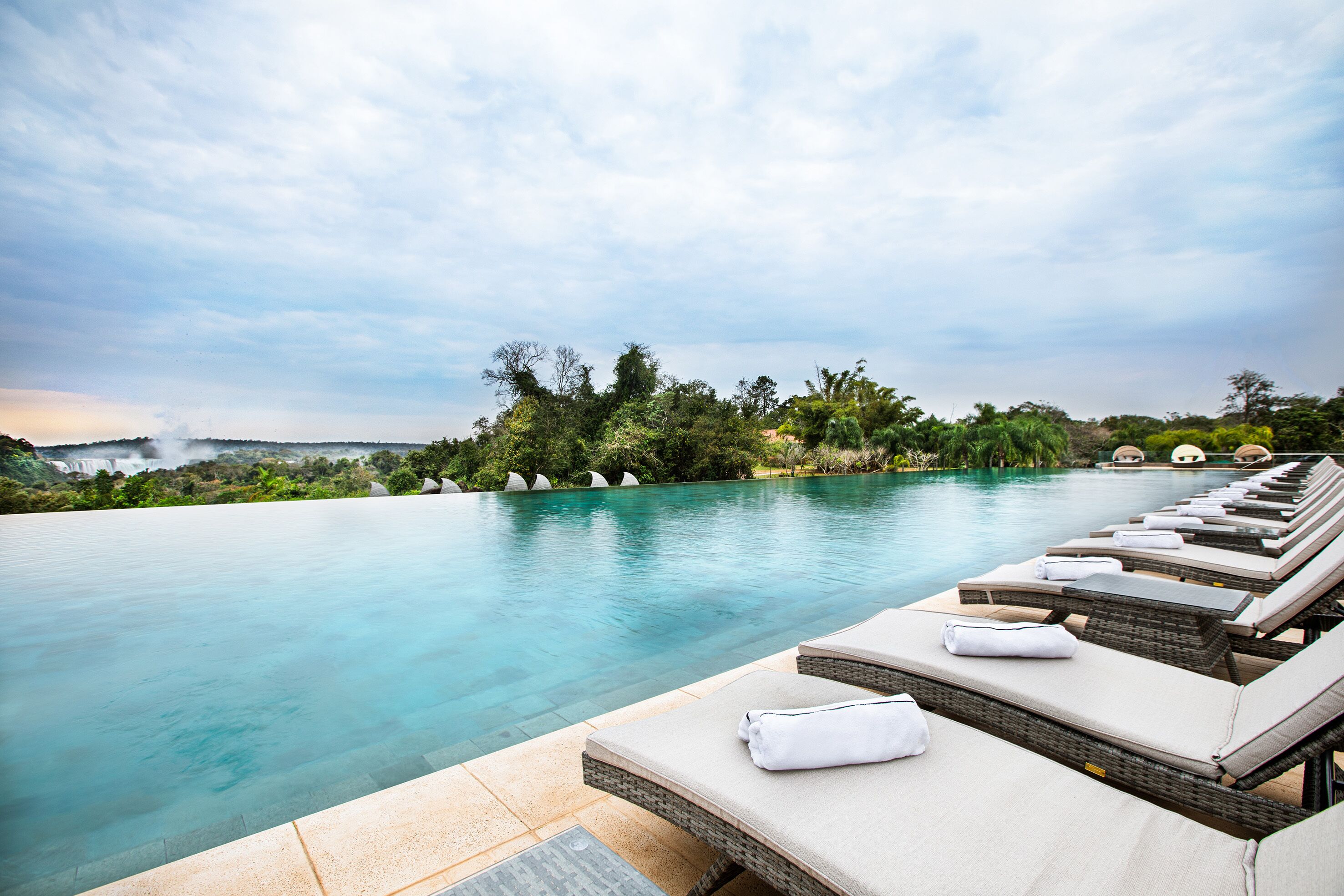 2 outdoor pools, open 9:00 am to 8:00 pm, pool umbrellas, pool loungers