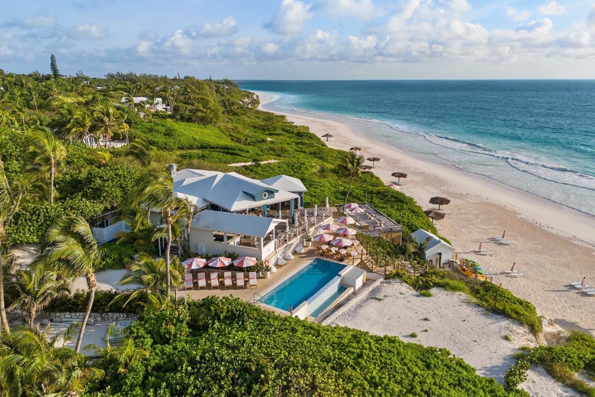 On the beach, white sand, free beach cabanas, sun loungers