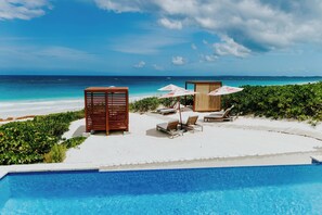 Outdoor pool, pool umbrellas, sun loungers