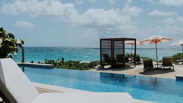 Outdoor pool, pool umbrellas, sun loungers