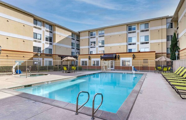 Seasonal outdoor pool, pool loungers