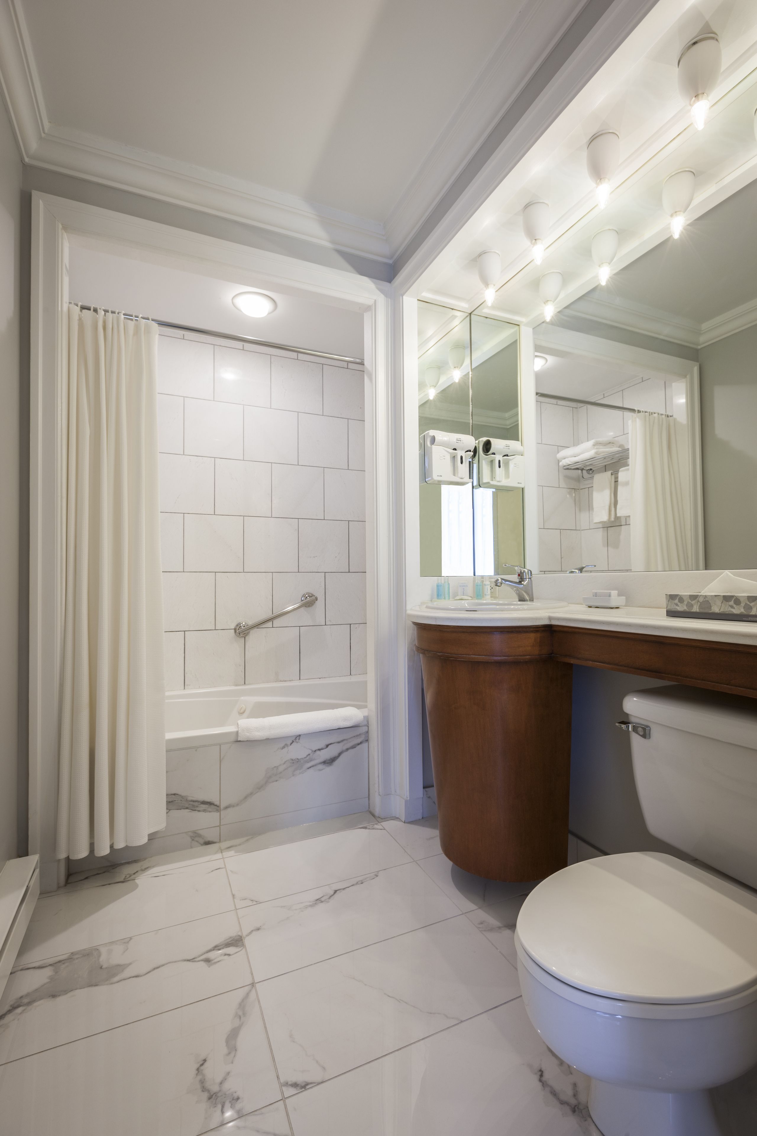 designer toiletries, hair dryer, bathrobes, towels