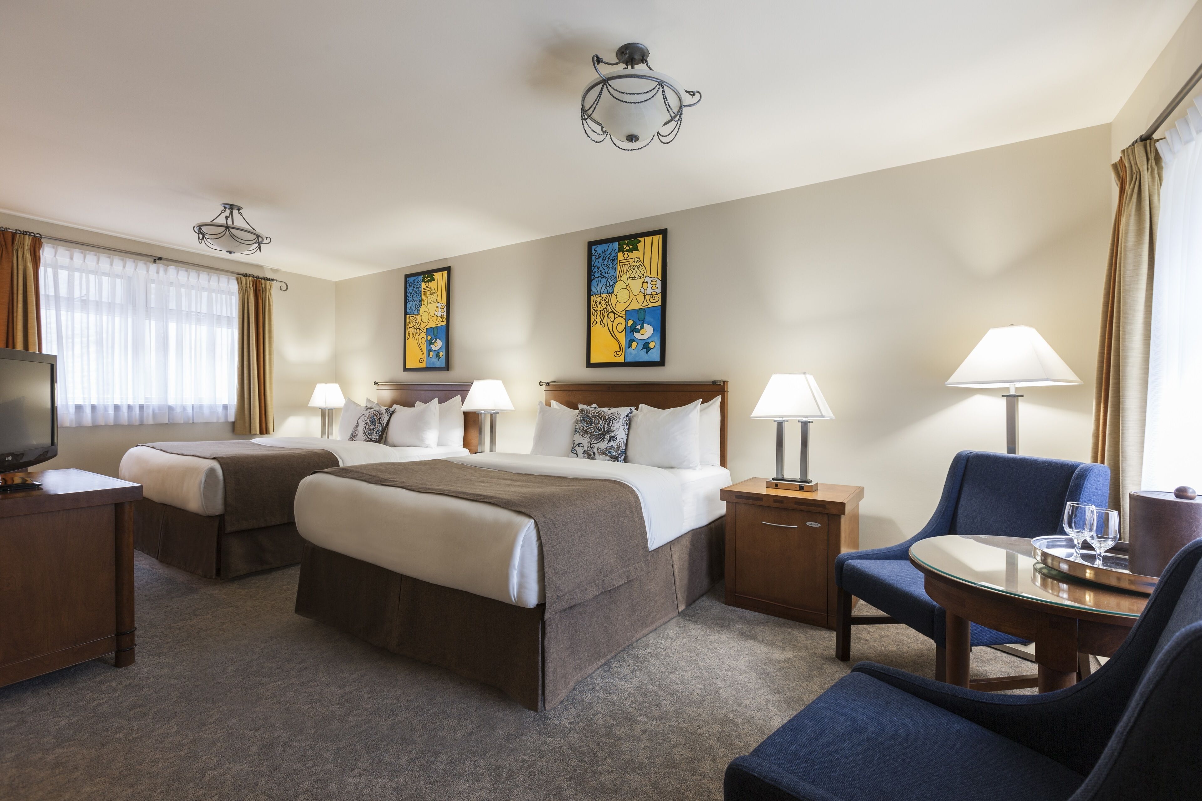 deluxe room, 2 queen beds | premium bedding, in-room safe, blackout curtains, iron/ironing board