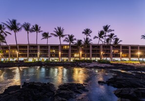 Enjoy stunning ocean views from this beachfront hotel, surrounded by palm trees and a modern architectural design.