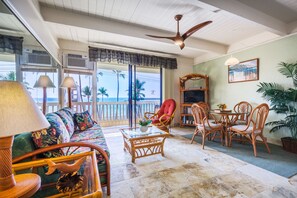 Suite, 1 Bedroom, Oceanfront | Living room | TV