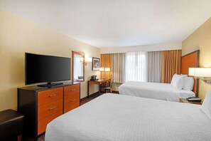 Pillow-top beds, blackout curtains, iron/ironing board, Internet
