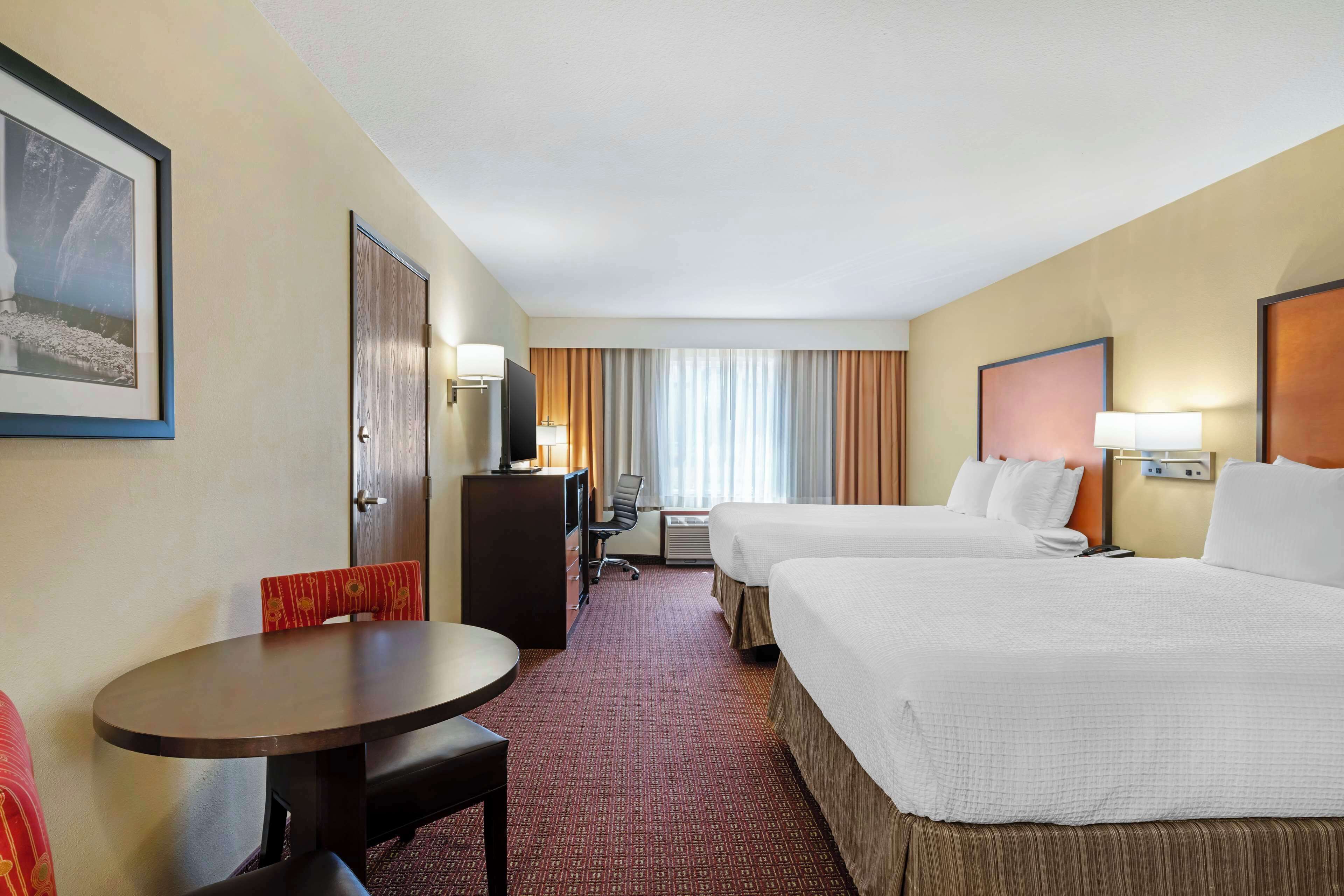 pillow-top beds, blackout curtains, iron/ironing board, internet