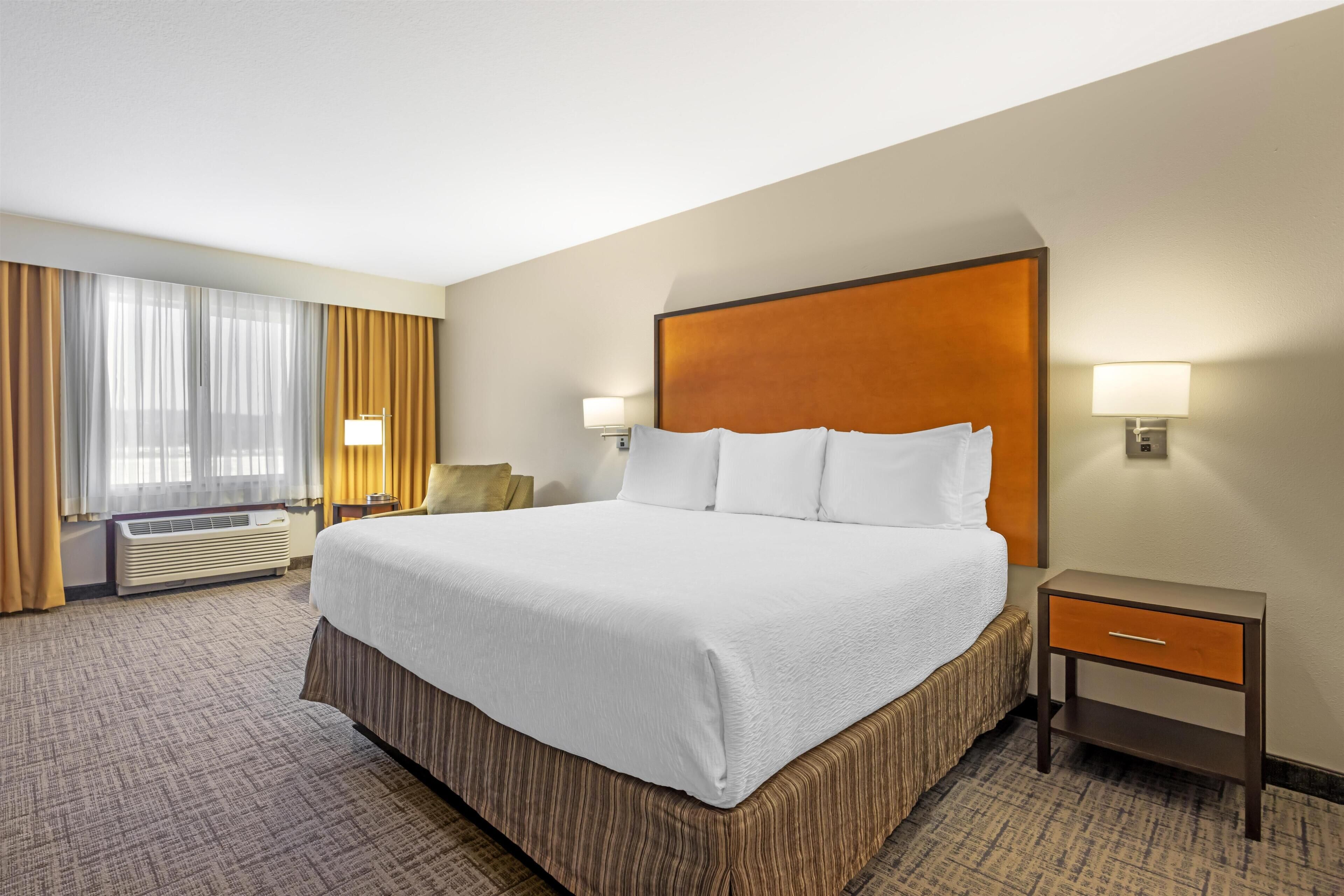 Standard Room, 1 King Bed, Non Smoking, Refrigerator & Microwave | Pillowtop beds, blackout drapes, iron/ironing board, high-speed internet
