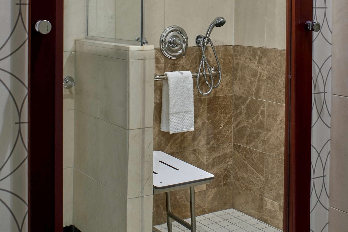 Superior Room, 1 King Bed, Mobility Accessible (Accessible) | Bathroom | Separate bathtub and shower, designer toiletries, hair dryer, bathrobes