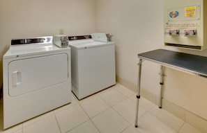 Convenient laundry facilities offer washing machines and a dryer for guest use.