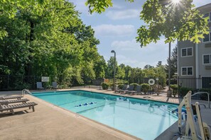 Seasonal outdoor pool, pool umbrellas, pool loungers