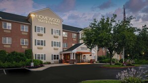 A hotel with a prominent "Homewood Suites by Hilton" sign, a brick facade, and a landscaped entrance area. - Homewood Suites by Hilton Boston / Andover (Andover)