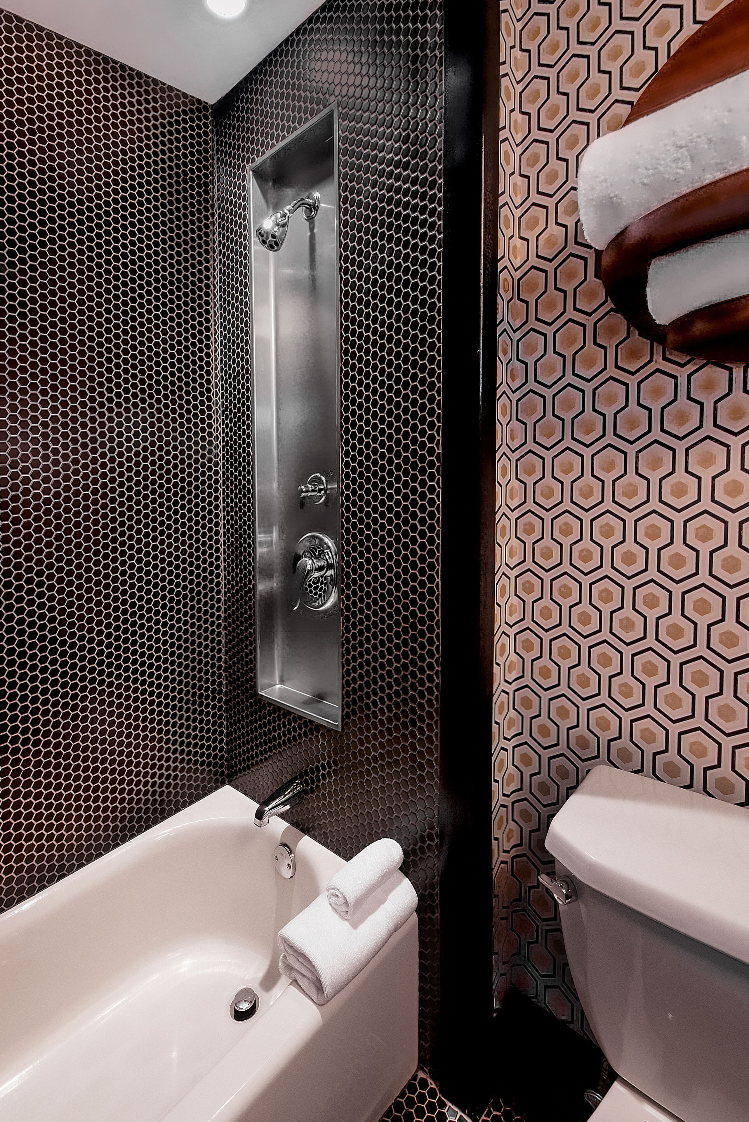 designer toiletries, hair dryer, bathrobes, towels