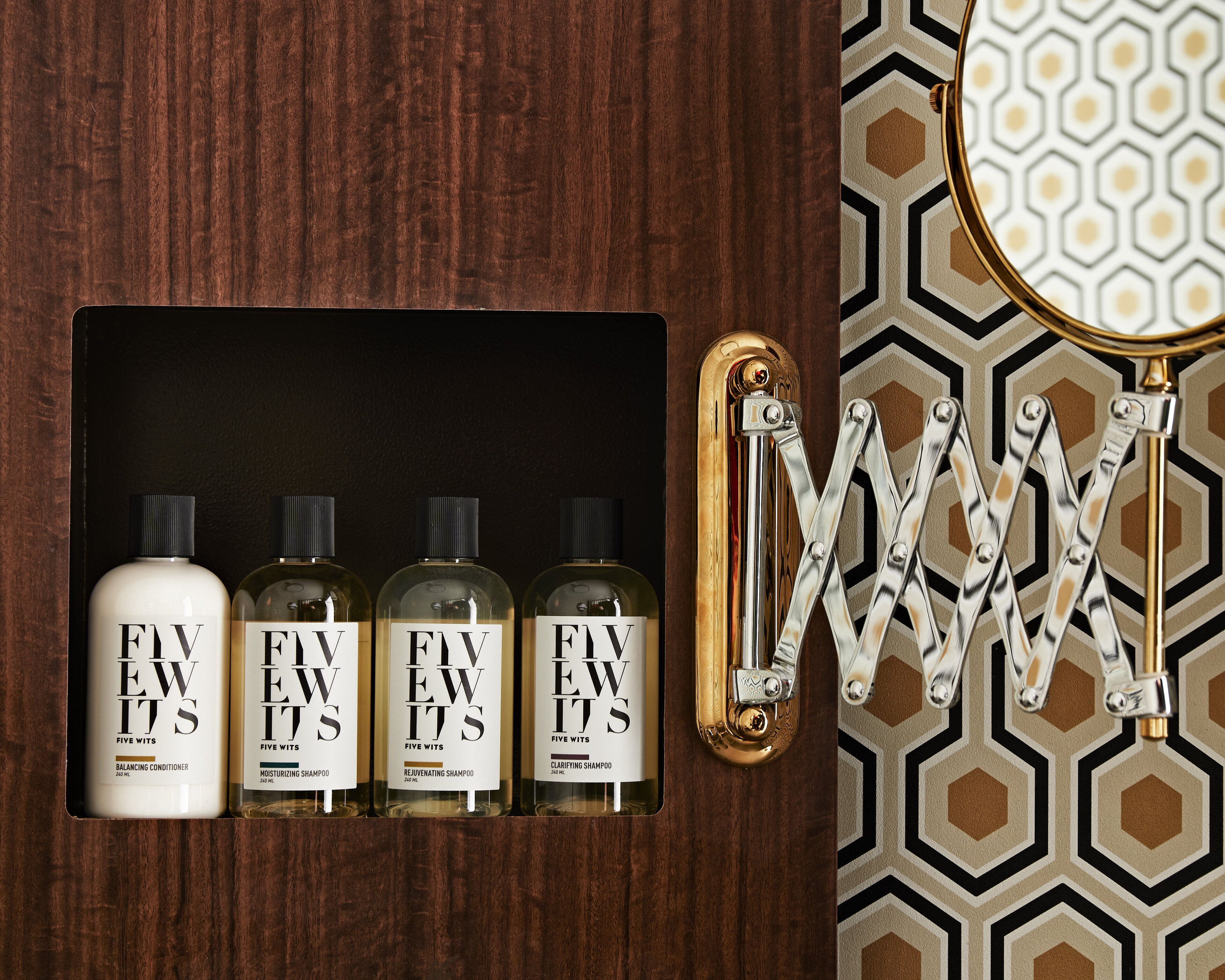 designer toiletries, hair dryer, bathrobes, towels