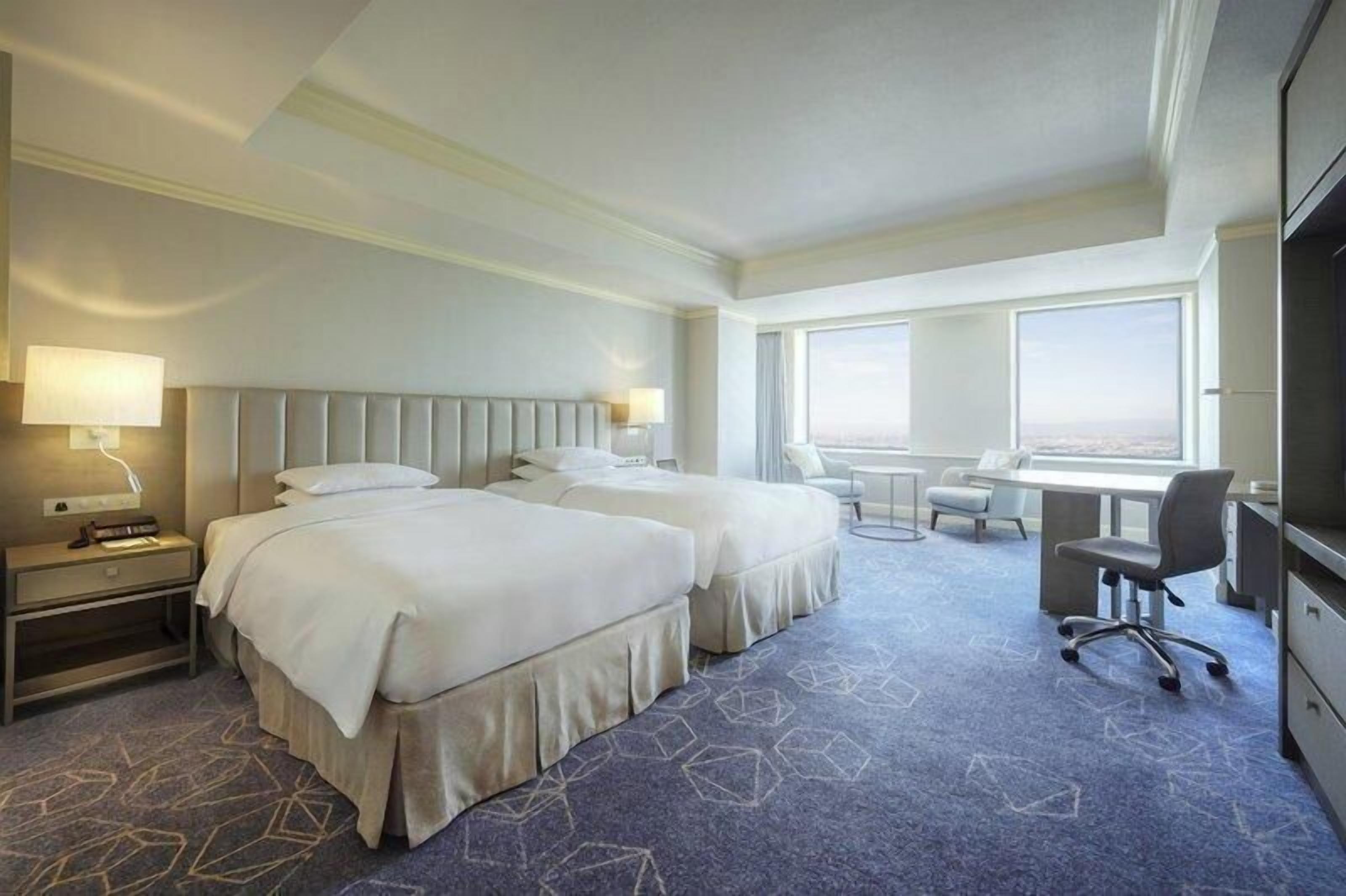 Ropa de cama de alta calidad, edredón y minibar 