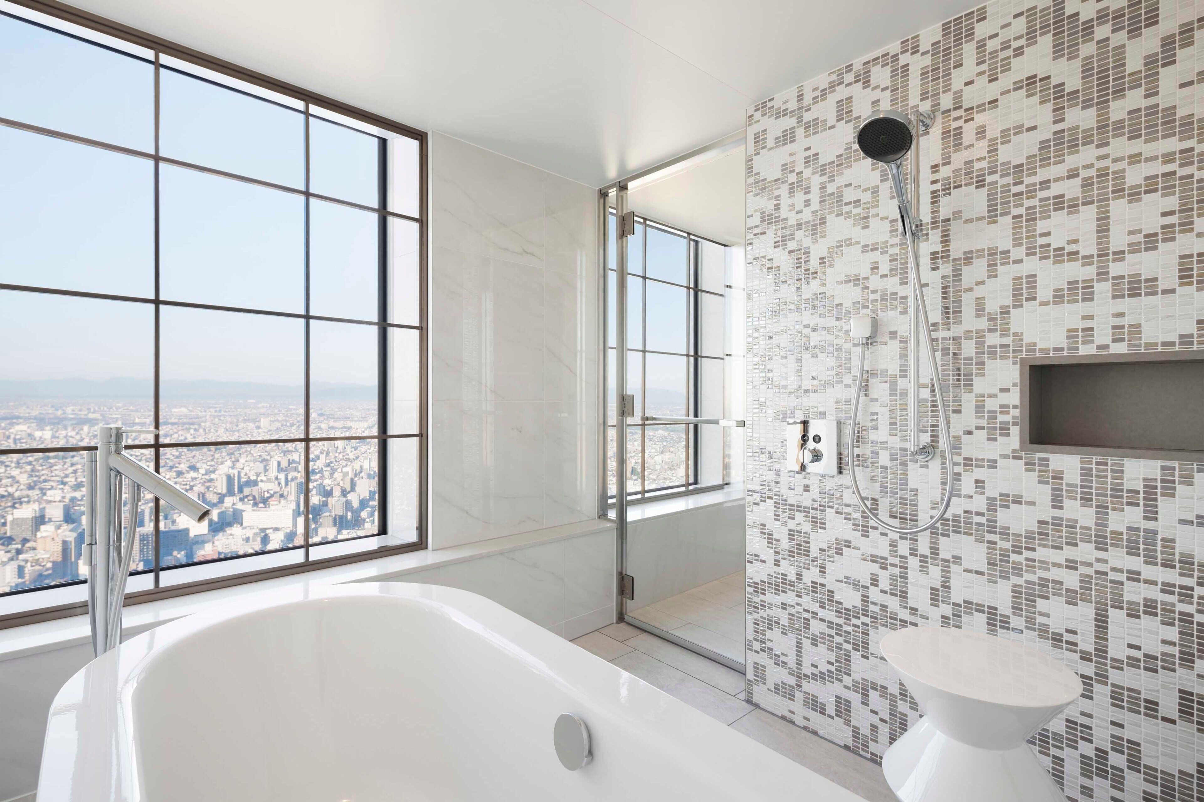 signature suite, 1 king bed, non smoking | bathroom | combined shower/bathtub, free toiletries, hair dryer, bathrobes