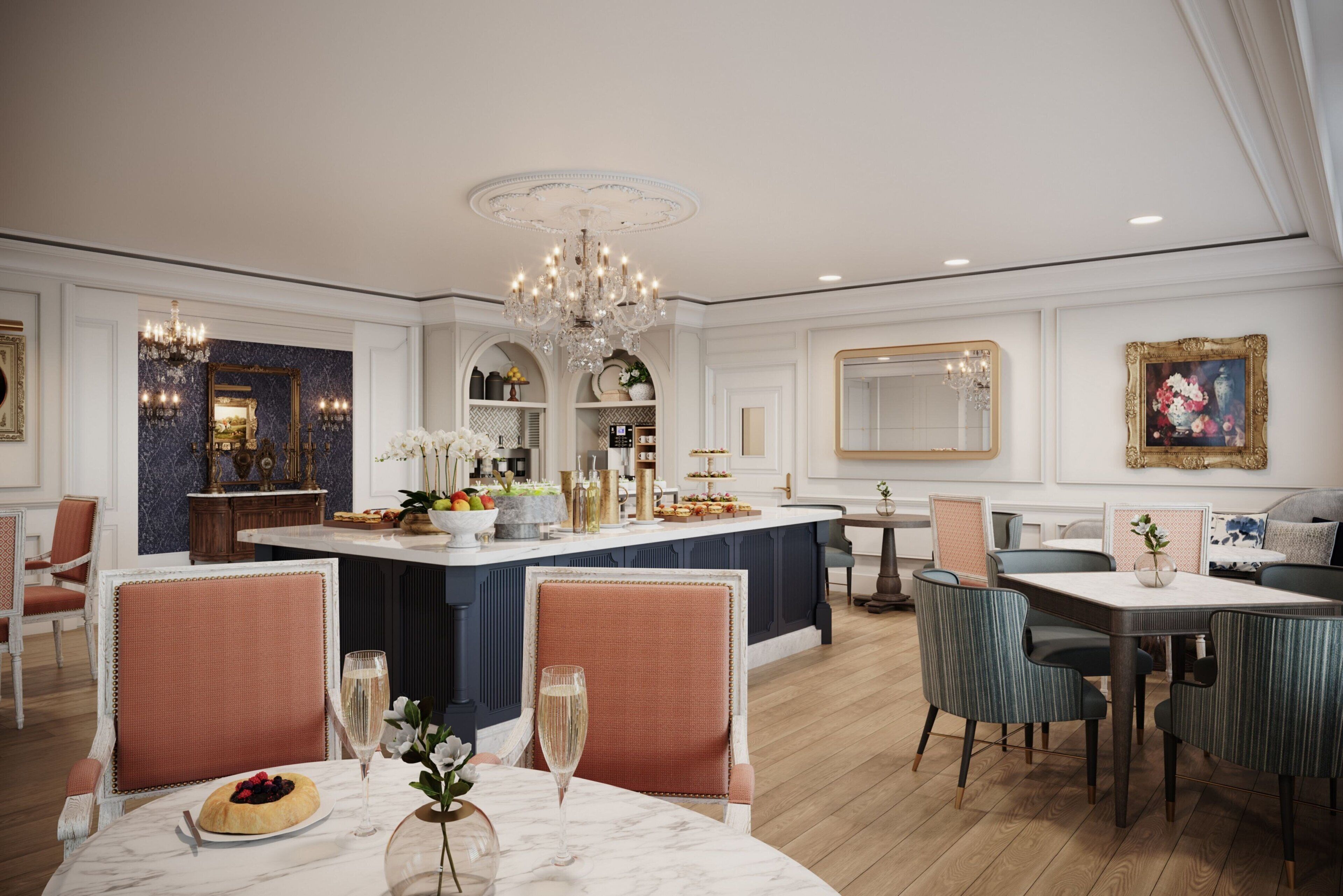 Un espace repas moderne avec une table en marbre, des chaises rembourrées et un îlot central surmonté d’un lustre.