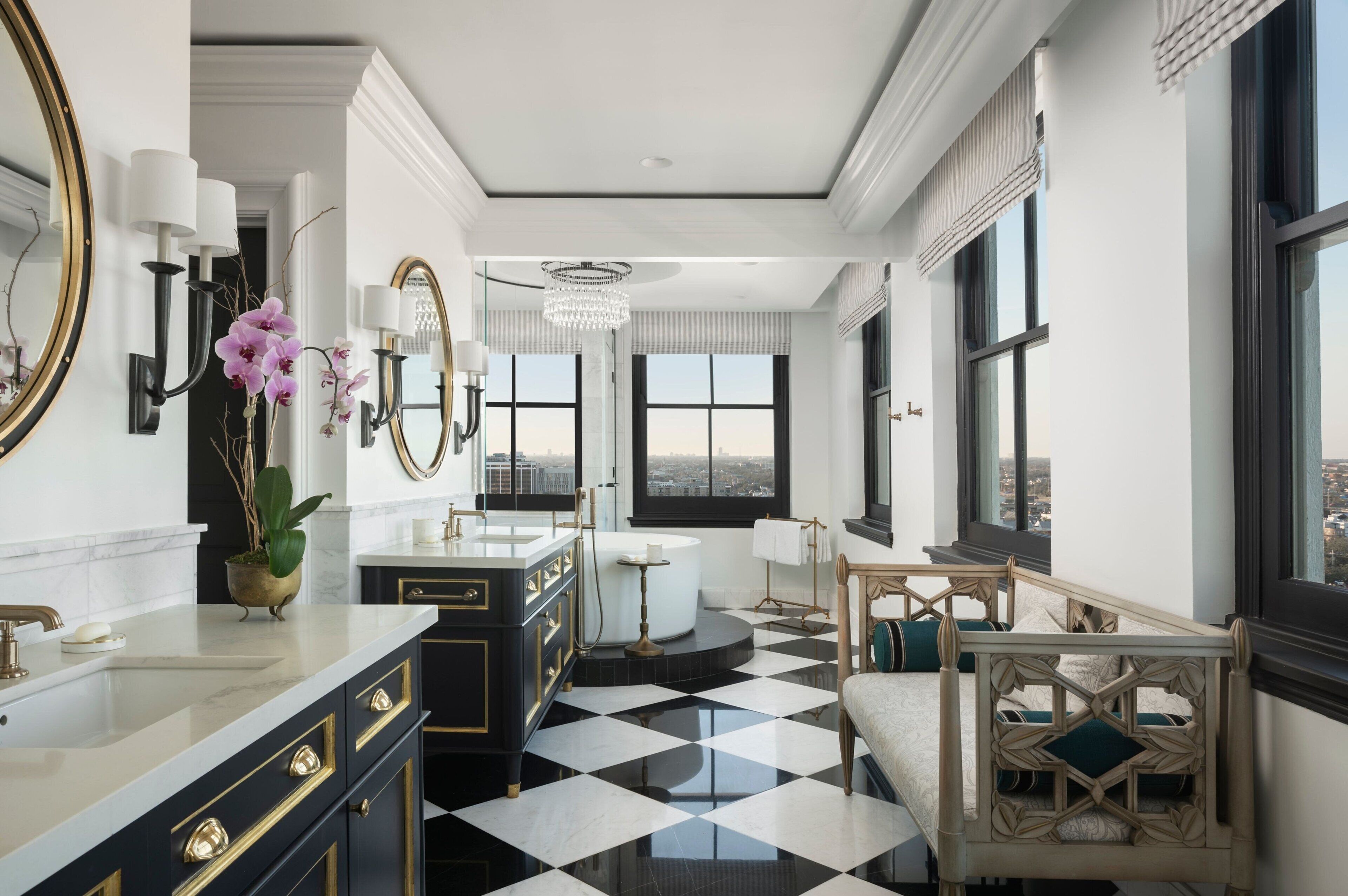 combined shower/bathtub, designer toiletries, hair dryer, bathrobes