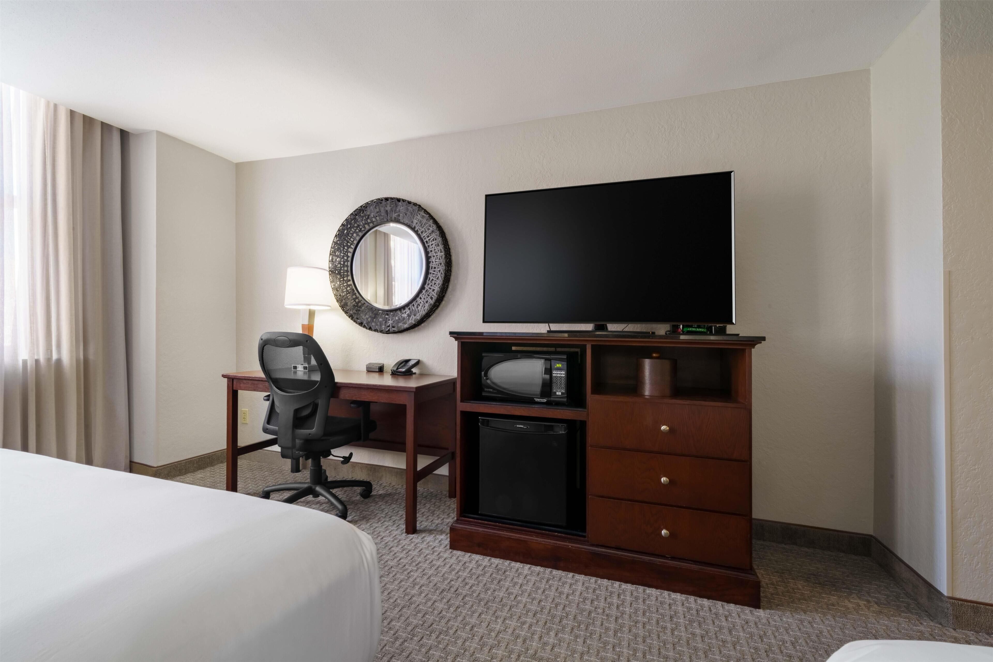 Desk, laptop workspace, blackout curtains, iron/ironing board