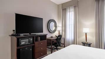 Desk, laptop workspace, blackout drapes, iron/ironing board