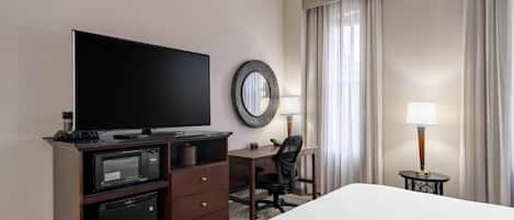 Desk, laptop workspace, blackout drapes, iron/ironing board