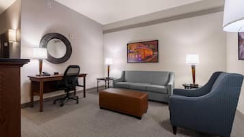 Desk, laptop workspace, blackout drapes, iron/ironing board