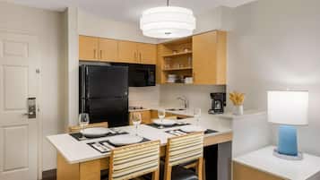 Full-sized fridge, microwave, stovetop, dishwasher