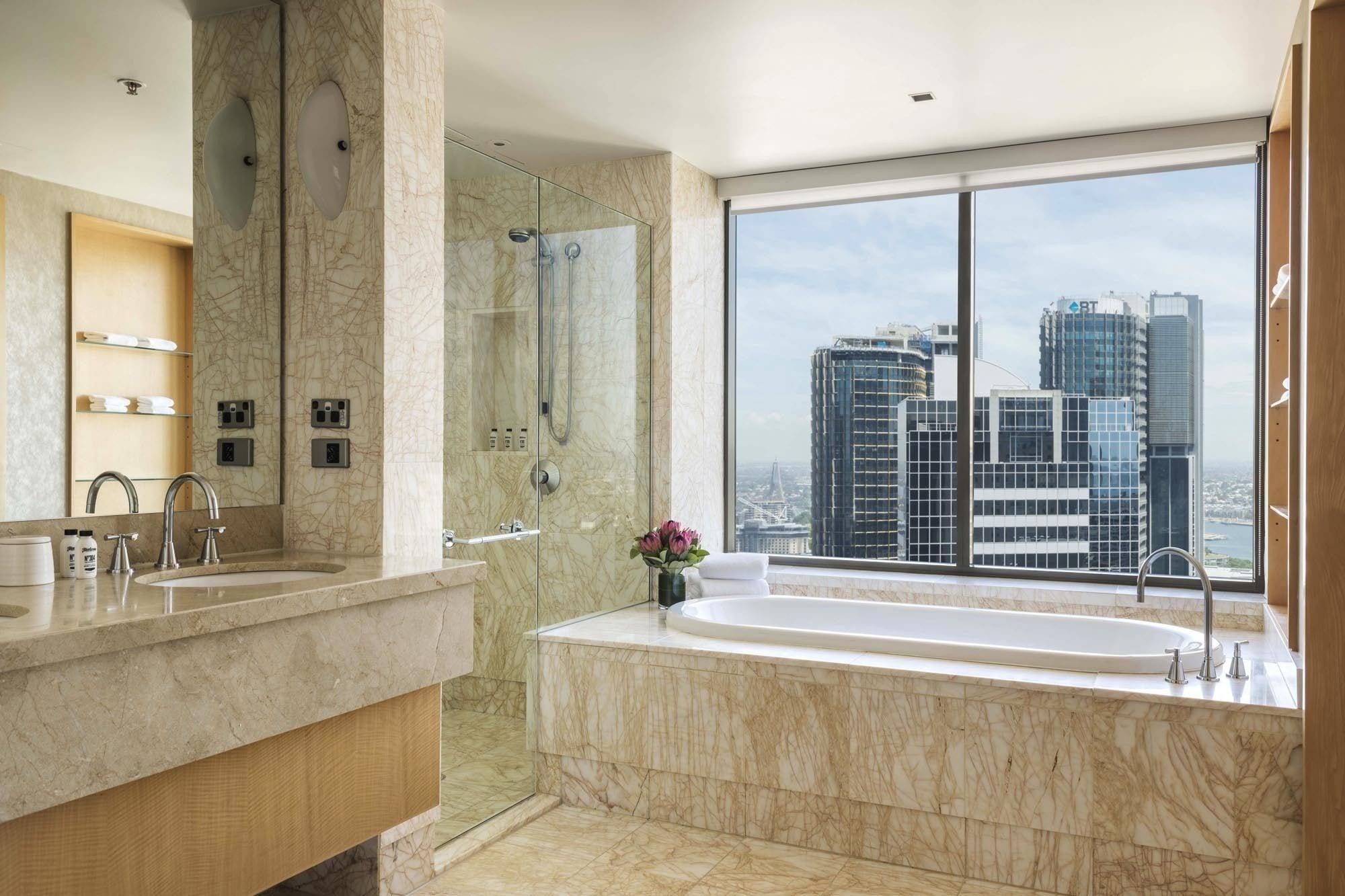 jamison club executive suite, business lounge access (high floor, partial water view) | bathroom | separate bathtub and shower, free toiletries, hair dryer, bathrobes