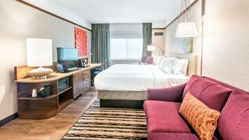 Desk, laptop workspace, blackout drapes, free cribs/infant beds